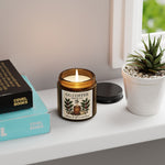 Coffee aroma scented soy candle on shelf, creating warm ambiance with cozy decor and plants.