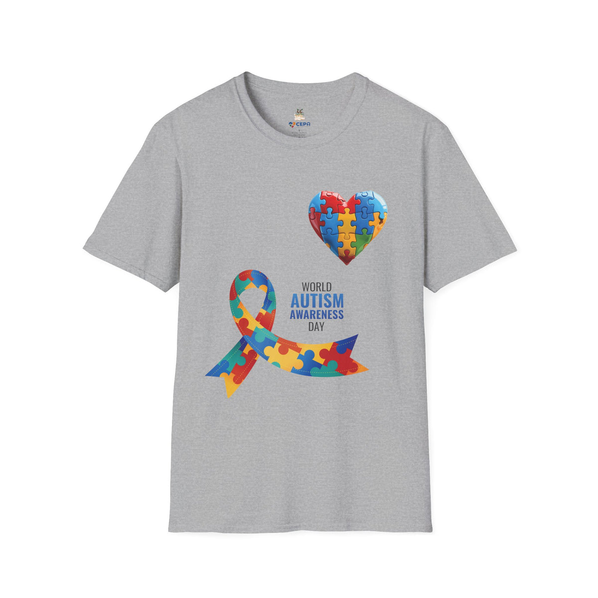 Gray t-shirt featuring a colorful heart made of puzzle pieces and a multicolored puzzle ribbon with the word “Autism,” symbolizing autism awareness, love, and inclusion.