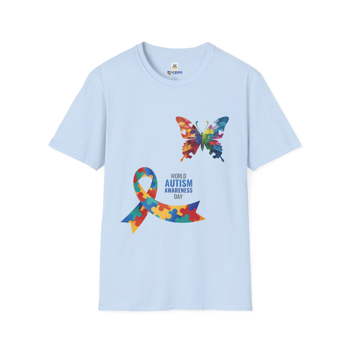 Light blue t-shirt featuring a colorful butterfly and multicolored puzzle ribbon design with the word “Autism,” symbolizing autism awareness and inclusion.