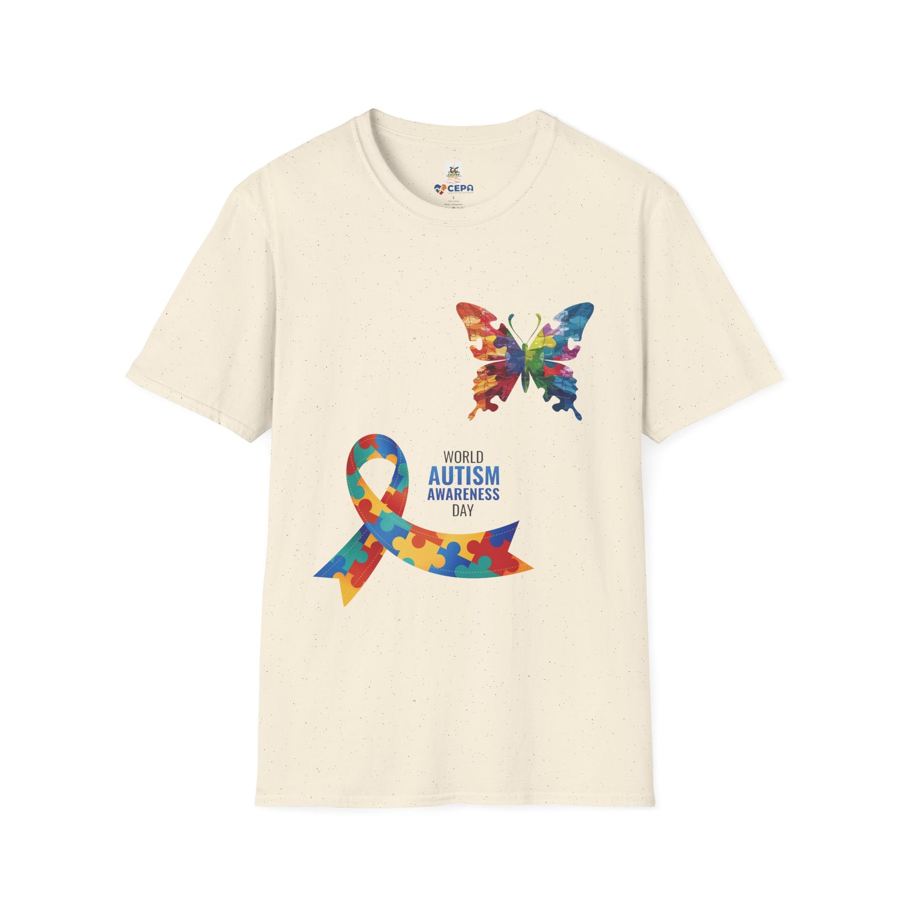 Natural t-shirt featuring a colorful butterfly and multicolored puzzle ribbon design with the word “Autism,” representing autism awareness and inclusion.