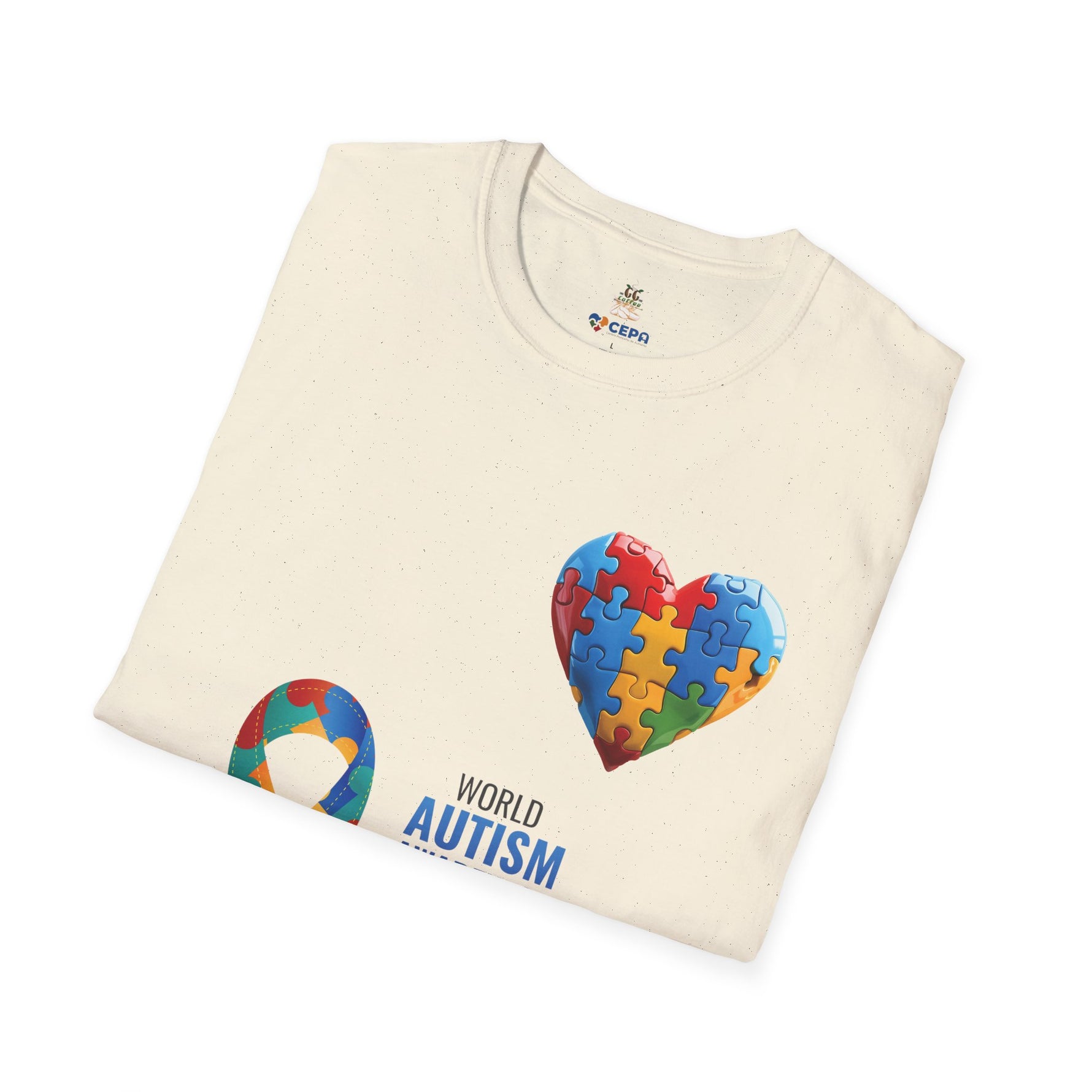 olded Natural t-shirt featuring a colorful heart made of puzzle pieces with the word “Autism,” symbolizing autism awareness, love, and inclusion.