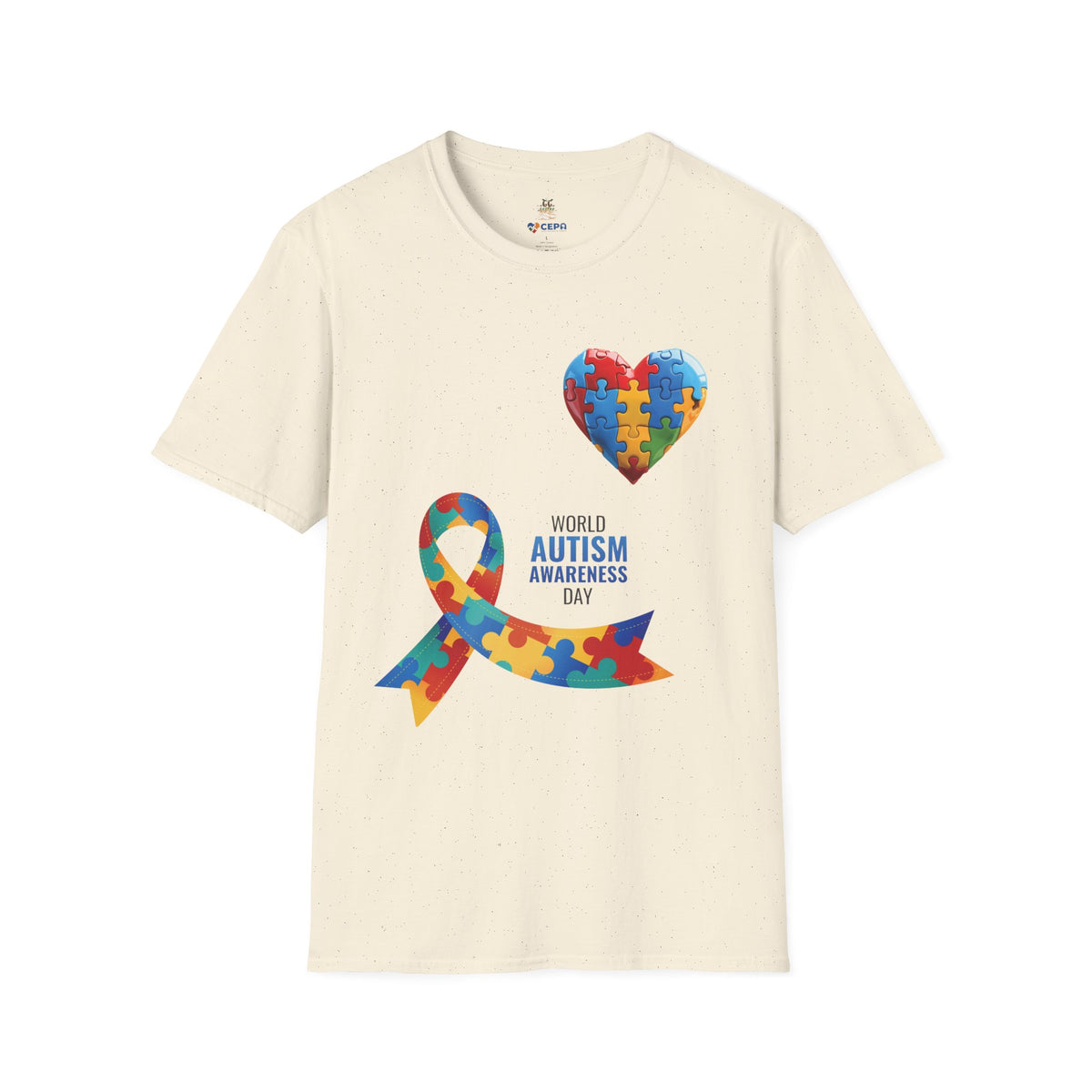 Natural t-shirt featuring a colorful heart made of puzzle pieces and a multicolored puzzle ribbon with the word “Autism,” symbolizing autism awareness, love, and inclusion.