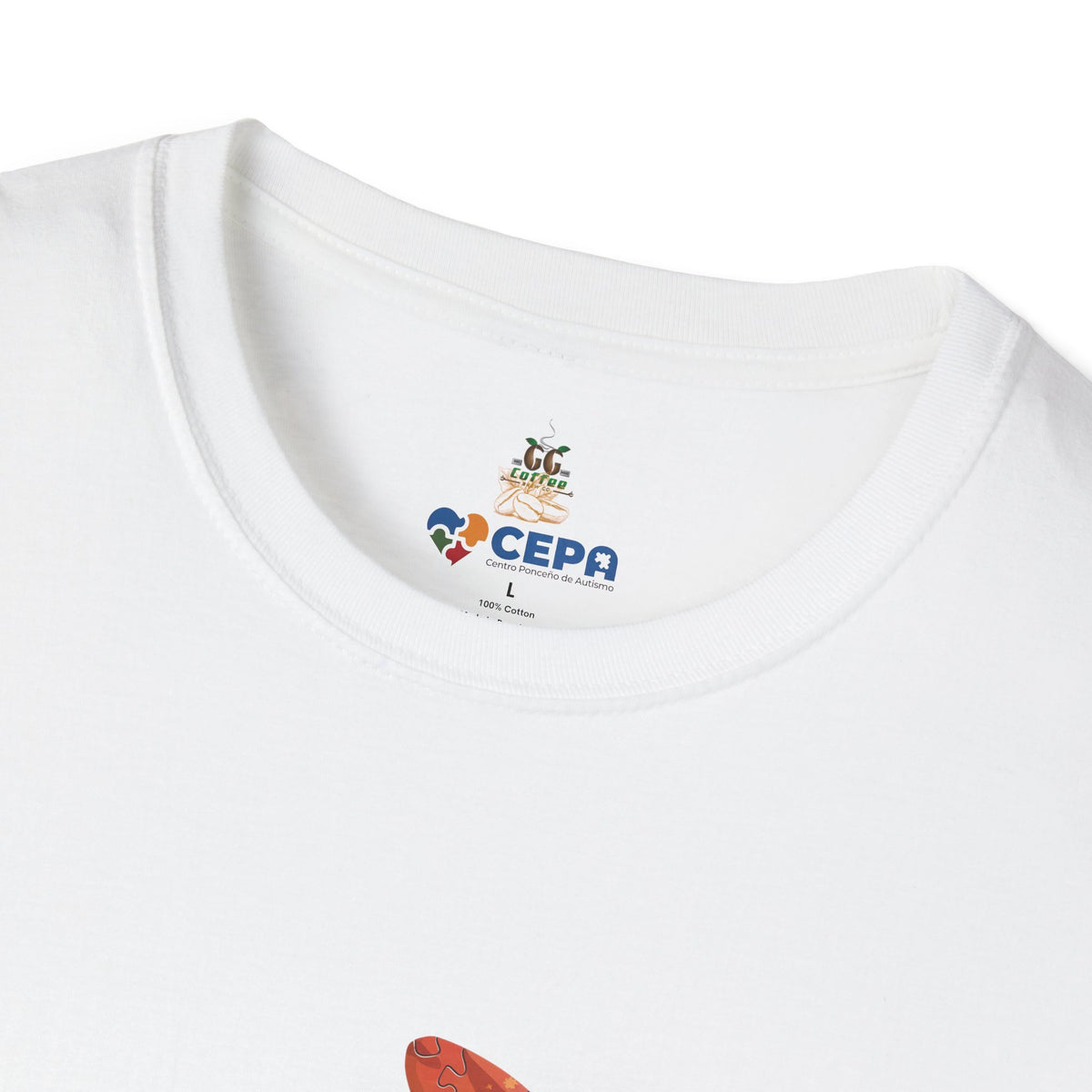 Close-up of a white t-shirt showing the GG Coffee Brew Co. and CEPA logo printed near the collar, representing autism awareness and support for inclusion.