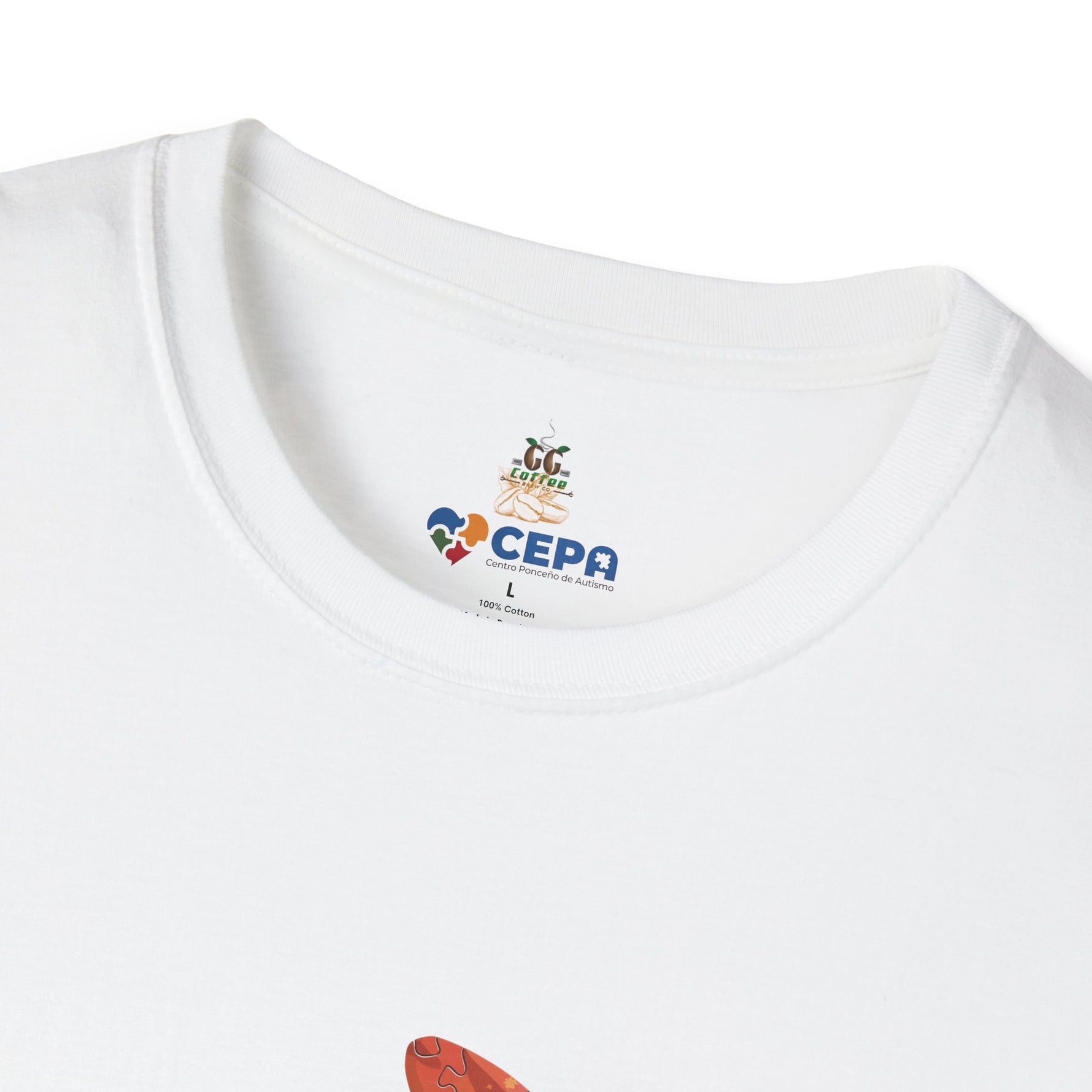 Close-up of a white t-shirt showing the GG Coffee Brew Co. and CEPA logo printed near the collar, representing autism awareness and support for inclusion.