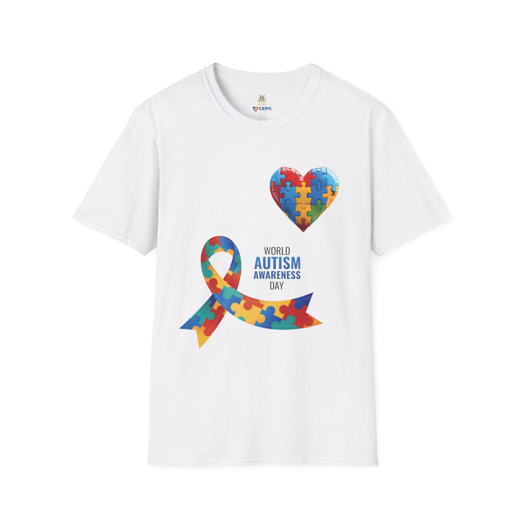 White t-shirt featuring a colorful heart made of puzzle pieces and a multicolored puzzle ribbon with the word “Autism,” symbolizing autism awareness, love, and inclusion.