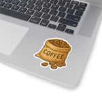 Coffee Lover's Kiss-Cut Sticker of a coffee bag with beans on a laptop, perfect for coffee fans and personalization.