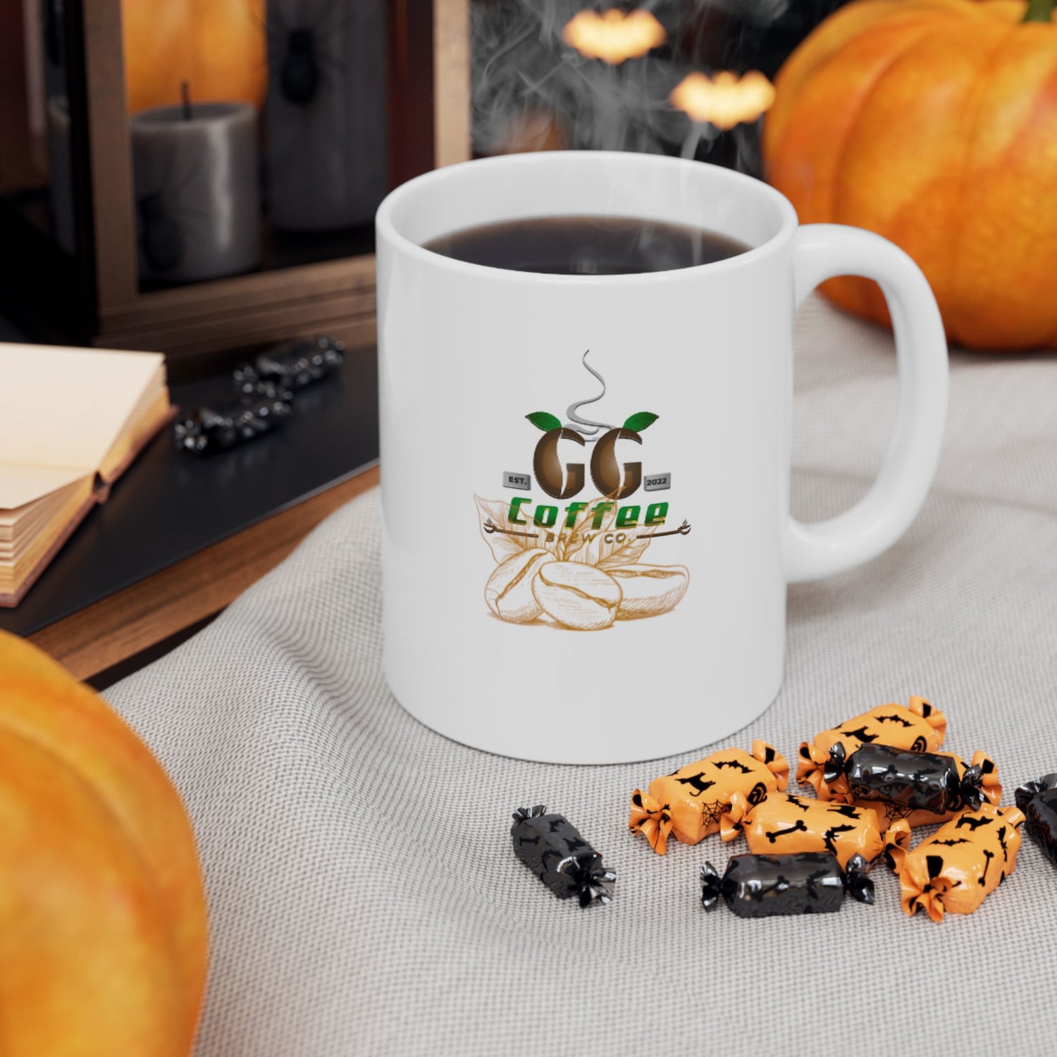 Cozy ceramic coffee mug with coffee and charming design, surrounded by pumpkins and spooky decorations.